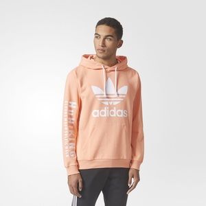 Peach Adidas sweatshirt by Pharrell